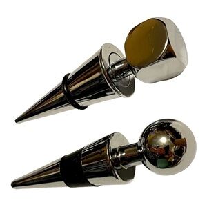 PAIR of stainless chrome wine stoppers.